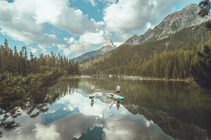 Stand-up paddleboarding on String Lake, Grand Teton National Park, Jackson Hole Wyoming -summer activities from Hotel Jackson