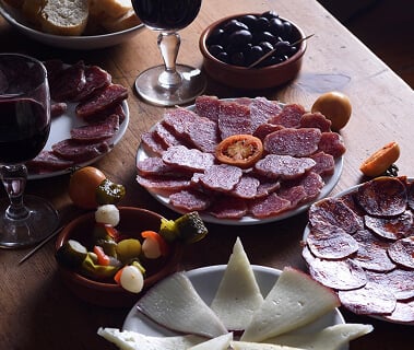 Charcuterie and cheese served with wine at Juliette